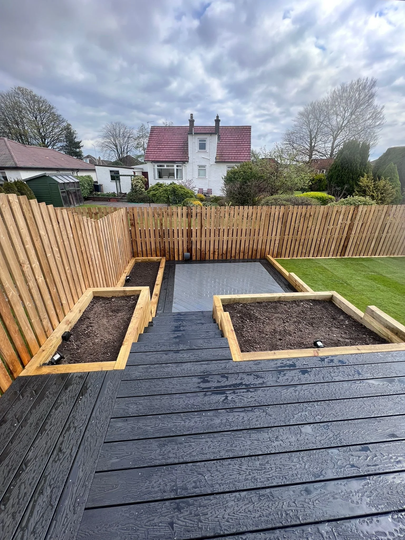 Composite decking with raised planters