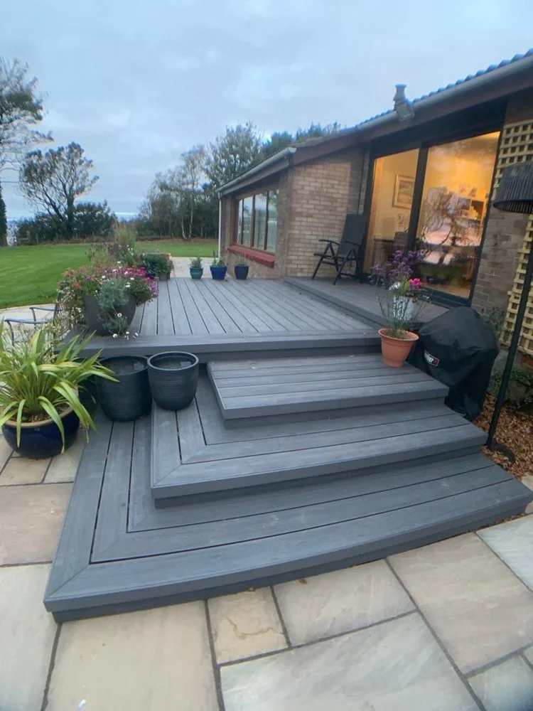 Grey composite decking with built-in steps